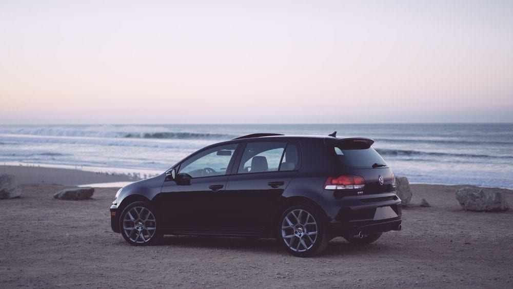 A car by the sea at dusk