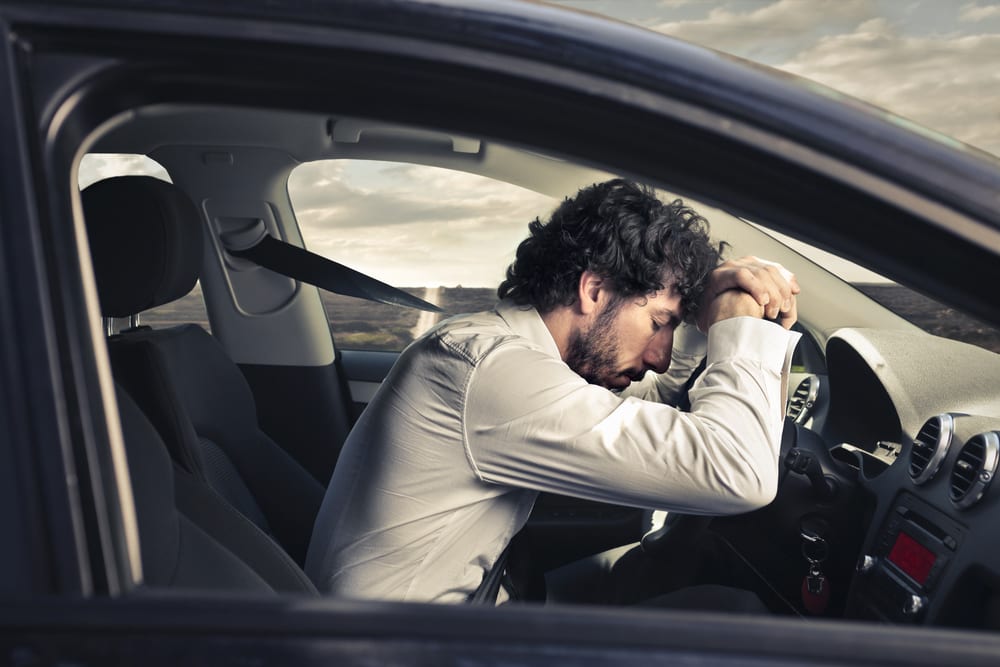 Tired driver in car