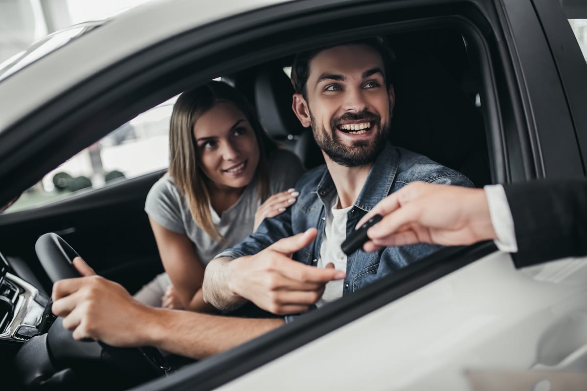 Couple buying a car