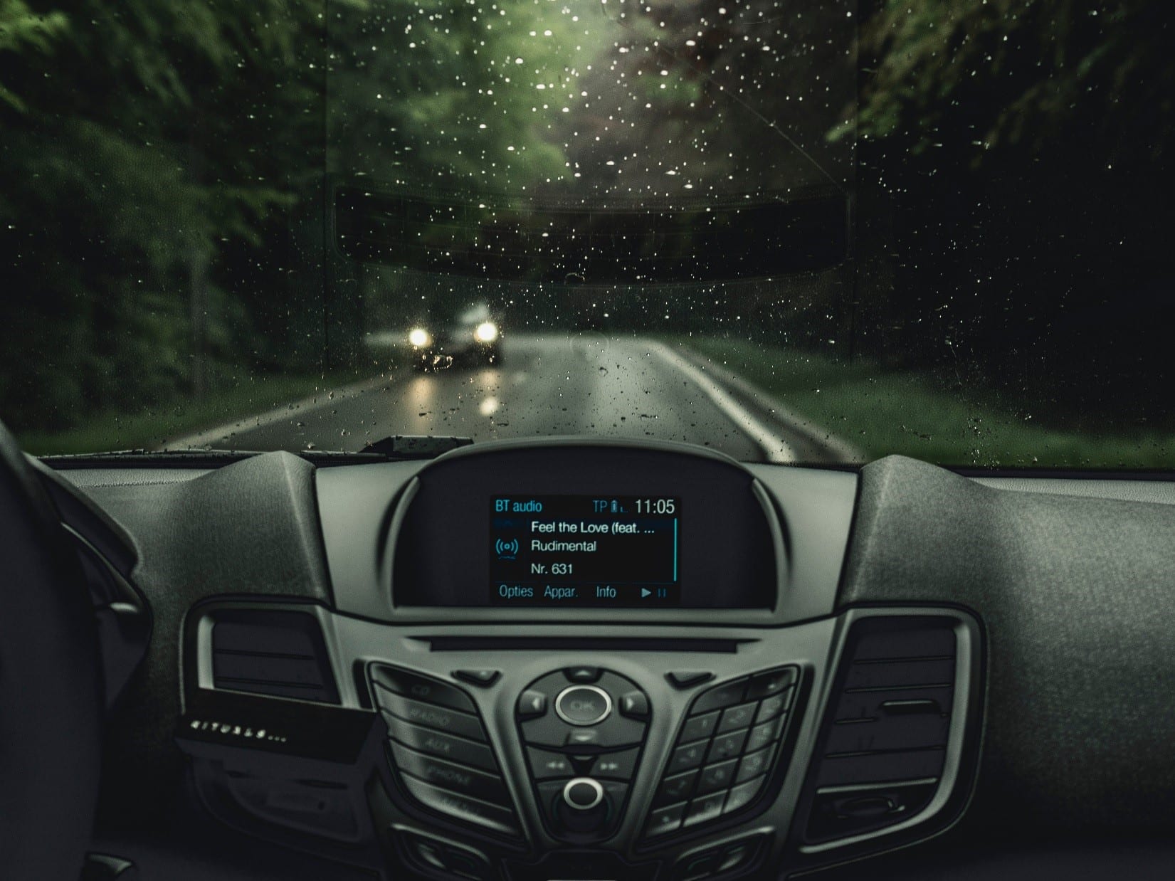 The car dashboard playing a song