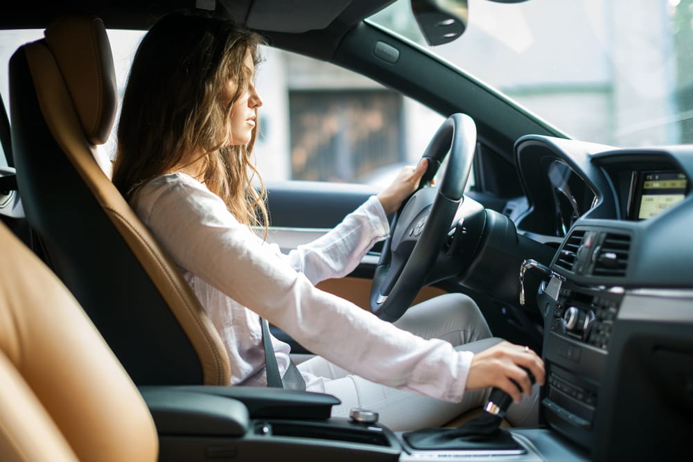 Woman driving in car