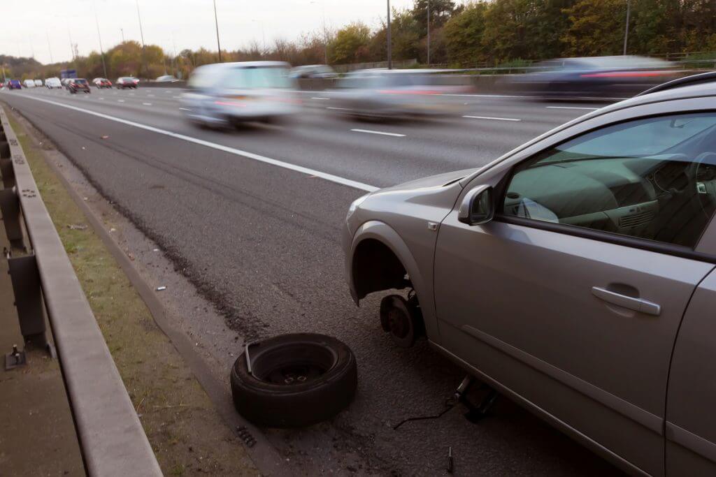 Broken down car on hard shoulder