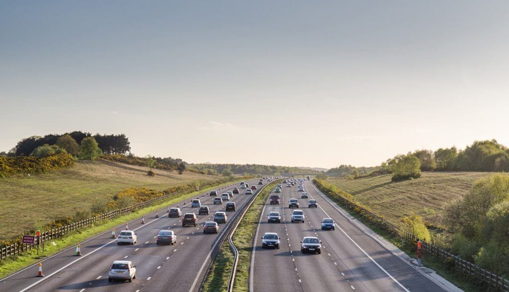 Cars driving down motorway