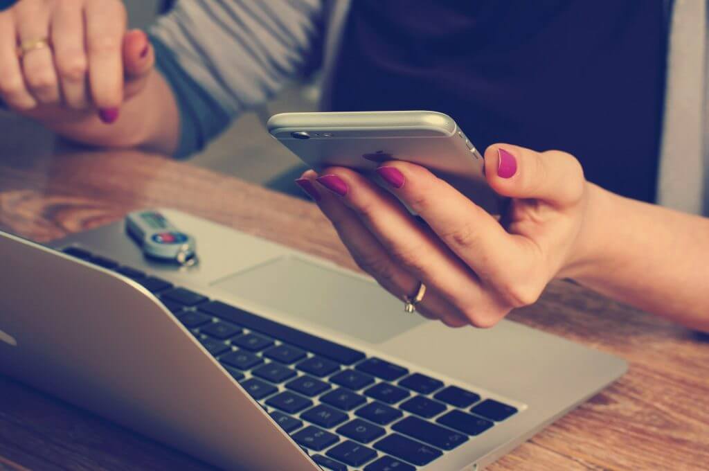 Woman on phone making insurance claim